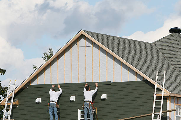Professional Storm Damage Siding Repair technician working in Marshall, VA
